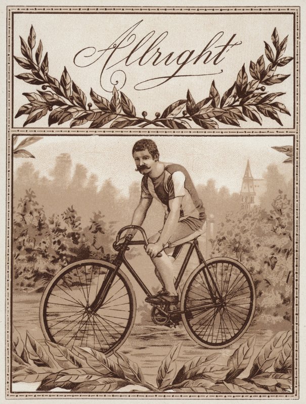 Mann fährt Fahrrad von American School