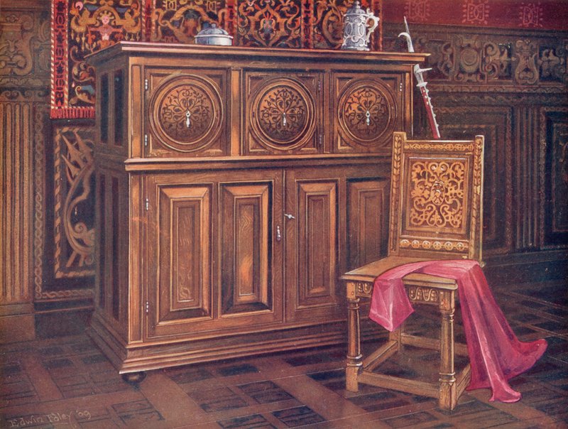 Eichenschrank mit kreisförmigen konvexen Paneelen, eingeschnittenes Arabeskenornament. Walnussstuhl mit verschlungenem Ornament von Edwin John Foley