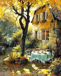 Mittagstisch im Garten eines Hauses in Frankreich