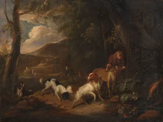 Jäger mit Hunden am Waldrand