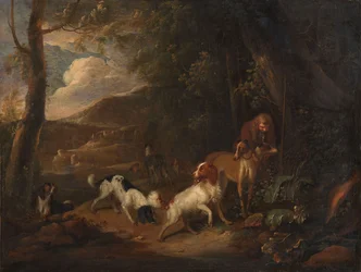 Jäger mit Hunden am Waldrand
