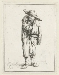 Stehender Bauer mit Hand und Arm in seinem Mantel