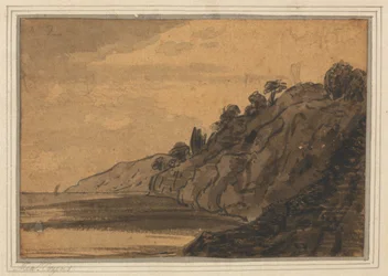 Küstenlandschaft mit bewaldeter Klippe
