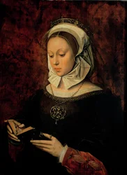 Junge Frau liest ein Stundenbuch