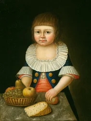 Junge mit einem Korb Obst