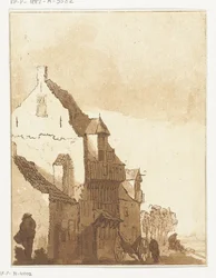 Haus mit Schubkarre vor der Tür