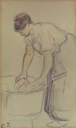 Frau beim Wäschewaschen