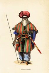 Edler Tuareg-Krieger von Agadez, Niger, in Tagelmust (Turban und Schleier), Taktkat (Hemd) und Akarbey (Hose)