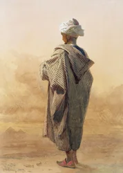 Kairo, ein Araber in der Dämmerung vor den Pyramiden
