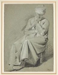 Sitzende Frau