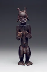 Ritualbehälter in Form einer stehenden männlichen Figur
