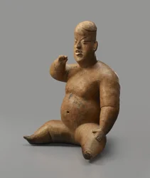 Sitzende Figur