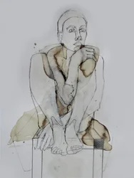 Nachdenkliche sitzende Figur