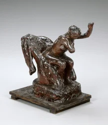 Frau sitzt in einem Sessel und wischt sich die linke Achselhöhle, ca. 1890er Jahre
