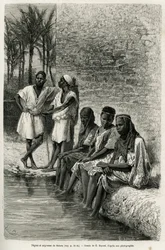 Schwarze Männer und Frauen aus der Sahara an den Ufern des Oued Rir. Stich von E. Bayard zur Illustration der Algerischen Sahara von V. Largeau, 1874-1878, veröffentlicht in Le Tour du monde unter der Leitung von Édouard Charton (1807-1890)