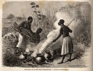 Die Bierproduktion im Ounyamouezi (Region der Großen Seen, Afrika), Zeichnung von Emile Bayard (1837-1891), Illustration der Entdeckungsreise in Afrika von 1860 bis 1863 von Captain Speke. Gravur in „Le tour du monde“, herausgegeben von Edouard Charton