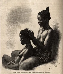 Junge Mädchen von Grand-Bassam (ehemalige Hauptstadt der Elfenbeinküste), beim Frisieren, Gravur nach einer Zeichnung von Emile Bayard, illustriert die Reise zur afrikanischen Küste im Jahr 1868, von Vizeadmiral Fleuriot de Langles, veröffentlicht in „Le t
