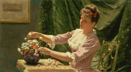 Junge Frau arrangiert Blumen