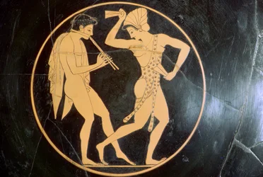 Vasenmalerei eines jungen Mannes, der Flöte spielt, und einer tanzenden Frau, 6. Jahrhundert v. Chr.