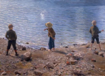 Drei Jungen am Strand