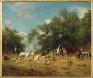 Arabische Reiter halten in einem Wald