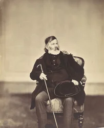 Sitzender Mann mit Stock und Hut, 1850er-60er Jahre