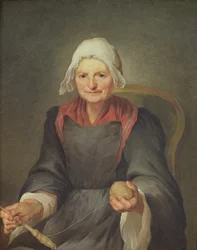 Eine alte Frau beim Spinnen