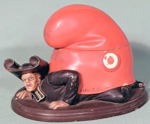 Ein Tintenfass oder Tabaktopf in Form eines von einer phrygischen Mütze zerquetschten Priesters, 1870