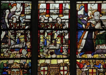 Fenster w13 zeigt Anne de Montmorency mit seinem Schutzpatron St. Anna (lehrt der Jungfrau das Lesen) und 5 seiner Söhne