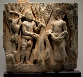 Kleiderwechsel mit einem Jäger. Flachrelief, Kunst von Gandhara (Pakistan), 2.-3. Jahrhundert. Nationalmuseum von Korea, Seoul (Südkorea).