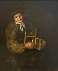 Alte Frau mit einer Lampe