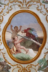 Gästeunterkünfte, der Raum der Putti, Medaillon mit Putti: "Zwei Putti und ein Papagei"