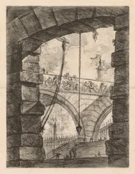 Die Gefängnisse: Ein hoher Bogen mit einem Fries