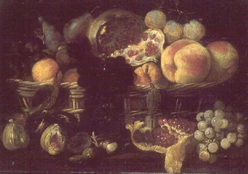 Ein Korb mit Obst und ein Teller mit Obst
