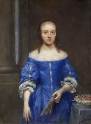 Porträt einer Frau in einem blauen Kleid