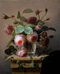 Stillleben mit rosa Rosen in einer Glasvase.