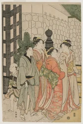 Junger Mann und Frauen auf der Tokiwa-Brücke