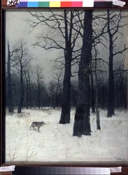 Wald im Winter. Schwarze, kahle Bäume im Schnee, mit einem Wolf