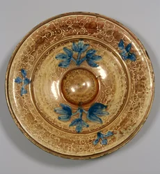 Dekorierter Teller mit blauen Blumen, maurisch (Faience)