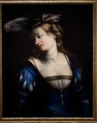 Junge Frau im blauen Mieder
