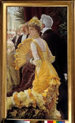 Gelbes Kleid: elegantes Paar bei einem gesellschaftlichen Abend