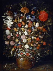 Blumen in einem Holzgefäß