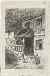 Fassade eines Hauses mit überdachtem Aufgang