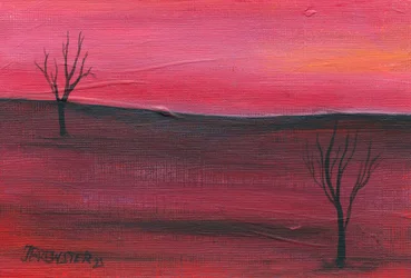 Kahle Bäume, roter Himmel