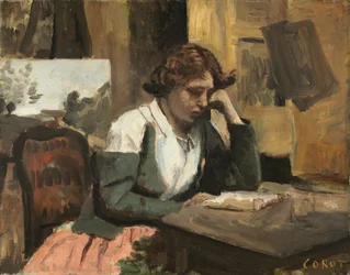 Frau, die im Atelier liest