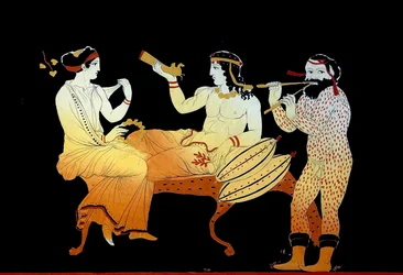 Dionysius mit einer Mänade und einem Satyr, der Aulos spielt.