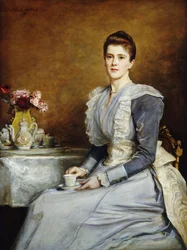 Porträt von Mrs. Joseph Chamberlain, sitzend an einem Teetisch, graues und weißes Kleid
