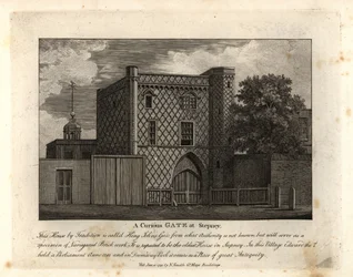 Ein kurioses Tor in buntem Ziegelwerk namens St. John Gate, das älteste Haus in Stepney