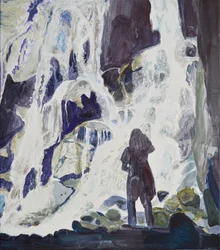 Person am majestätischen Wasserfall