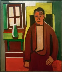 Mann, vor Fenster stehend